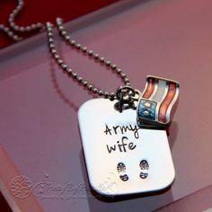 Wear your soldier close to your heart! This is just the right size dog tag adorned with a American flag charm to accent the tag "Army Wife".Purchase Includes:- One 1/2" x 1" Mini Dog Tag Stamping Blank, 22g Stainless Steel- One Adjustable 24" Ball Chain Necklace- One American Flag CharmThis 22g stamping blank is thick and durable and will last forever with a little polishing to keep it nice and shiny. I personally hand stamp each piece and do my best to align all letters and make you a one-of-a- First American Flag, Army Tags, Soldier Wife, Mini Dog, Handwriting Jewelry, Wife Necklace, Mini Dogs, Army Wife, Military Wife