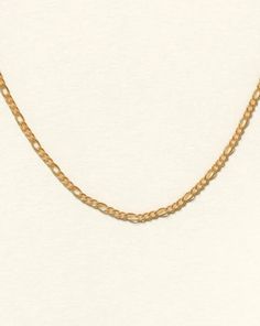 Our Gianna chain is as classic as the Italian chain gets. One of the most popular chains in our collection, she's perfect for layering with multiple necklaces for a sophisticated look. She's tarnish-resistant, showerproof, and gentle on the skin so you can wear her wherever your heart desires. …………………………………. D E T A I L S • Chain length comes in three lengths: measures 16, 18, or 20 inches • Chain thickness measures 1.5 mm • Spring clasp • 100% 18k Gold Filled • Tarnish-resistant, waterproof, sa Dainty Double Chain Link Necklace, Elegant Figaro Chain Necklace For Layering, Classic Double Strand Delicate Chain Necklace, Elegant Everyday Layered Figaro Chain Necklace, Long Figaro Chain Necklace As Gift, Figaro Chain Long Necklace As Gift, Trendy Double Strand Figaro Chain Necklace, Trendy Double Strand Figaro Chain Necklaces, Trendy Figaro Chain Link Necklace