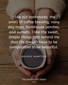 two hands holding a cup of coffee with the words, i like old bookstores, the smell of coffee brewing, rainy days, farm house porches, and sunsets