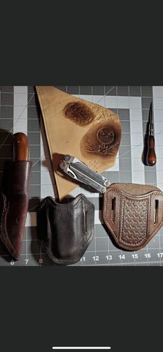 several different types of leather items on a table