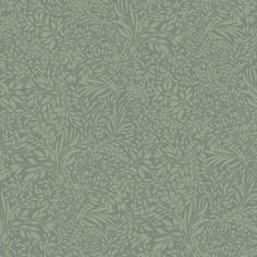 a green wallpaper with leaves and vines on the side, in shades of grey