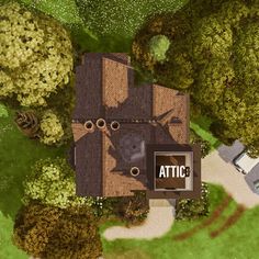 an aerial view of a house in the middle of some trees and bushes with a sign that reads attic