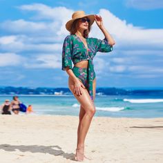 Elevate your beach style with our Paisley Open Front Cover-Up Top. This chic and versatile piece features a knotted detail and an open front design, perfect for layering over your swimsuit with a touch of bohemian charm. Whether you're lounging on the beach or sipping cocktails by the pool, this cover-up top is the perfect addition to enhance your beach attire with a hint of sophistication and flair. Product code: DAA07A4C001RR Beach Season Cover-up With Tie Waist, Summer Beach Cover-up With Tie Waist, Beachy Tied Swimwear For Summer, V-neck Swimwear With Tie Waist For Summer, Tied Swimwear For Summer, Spring V-neck Swimwear With Tie Waist, Summer Beach Swimwear With Tied Details, Summer Tied Swimwear For Beach Party, Tied Swimwear For Summer Vacation