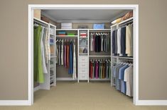 an open closet with clothes and other items