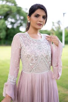 Dusty pink flared bell sleeves pleated flare kurta in chinon base with begonia gardenia embroidery on the bodice using pearls, beads, cut dana, tonal sequins highlights. Paired with a pleated flare sharara. - Aza Fashions Sharara For Women, Pearls Embroidery, Kurta With Sharara, Pearl Embroidery, Aza Fashion, Dusty Pink, Bell Sleeves, Bodice, Types Of Sleeves