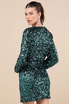 You'll leave everyone instantly impressed by your stunning ways in the Lulus Indescribable Shine Teal Green Sequin Long Sleeve Mini Dress! An array of shimmering teal sequins dance across a mesh overlay as it shapes a lightly gathered bodice with a flirty surplice neckline and long sleeves (with elastic at the cuffs). The fitted, elasticized waist tops a bodycon skirt that finishes at a cute mini hem. Fit: This garment fits true to size. Length: Mid-thigh. Size medium measures 30" from shoulder Mini Dress Sequin, Short Green Dress, Casual Formal Dresses, Gathered Bodice, Lulu Fashion, Dress Sequin, Bodycon Skirt, Casual Wedding Dress, Green Sequins