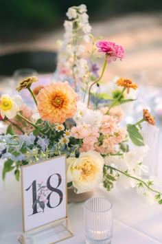 beautiful and romantic bright spring floral centerpiece for wedding table. Wedding at Lady Bird Johnson Wildflower Center. Photography by Tara Paige Weddings. Planning by Kristin Catter Events. Florals by Caroline James Floral. #austintx #austinweddingphotographer #springweddinginspo #colorfulwedding #austinwedding #atxwedding #austinweddingvenue #gardenwedding #modernweddingphotography #austinweddingplanner Types Of Centerpieces, Spring Wedding Table Florals, Wedding Centerpieces Diy Spring, Wildflower Table Setting Round, Summer Wedding Table Centerpieces Bright Colors, Pastel Wildflower Wedding Table, Round Table Wildflower Wedding, Flowers For Spring Wedding