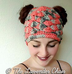 a woman wearing a crocheted headband and smiling