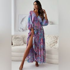 Zendaya Patterned Batwing Maxi Dress-Purple Elevate Your Summer Wardrobe With The Stunning Zendaya Patterned Batwing Maxi Dress. Available In Different Colours. Featuring A Trendy Front 'V' Neckline And Tiered Frill Detail (Bottom Half), This Dress Is Effortlessly Stylish. The Batwing Style Sleeves And Elasticated Cuffs Adds A Touch Of Comfort, While The Soft And Stretchy Fabric And Elasticated Waistband Ensure The Perfect Fit. With Approx. Sizes Ranging From: S (Uk 8) M (Uk 10) L (Uk 12) Xl (Uk Catwalk Dress, Festival Batik Print V-neck Maxi Dress, Zara Maxi Dress, Purple V-neck Beachwear Maxi Dress, Pink Floral Maxi Dress, V-neck Abstract Print Beach Dress, Bohemian V-neck Maxi Dress With Abstract Print, Embellished Gown, Multicolor Abstract Print V-neck Maxi Dress