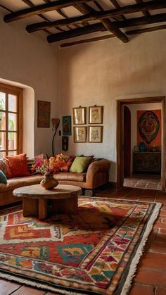 a living room filled with furniture and lots of windows