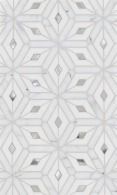 an abstract white tile pattern with silver squares and rectangles on the bottom half