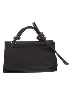 Redefine your style with this versatile handbag that sports a double closure and carries an iconic status. Crafted with satiny nylon and a bold tubular leather handle, this bag is an epitome of understated and sustainable luxury. Whether you carry it by hand or over the shoulder, it never fails to make a statement. Double closure for added security Can be worn by hand or over the shoulder for versatility Satinized nylon body for a luxurious feel Bold tubular leather handle for a striking look Du Black Designer Handbags, Large Leather Handbags, Evening Dinner, Black Luxury, Baby Hands, Black Leather Handbags, Black Handbags, Black Design, Bago