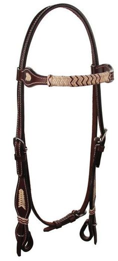 a brown horse bridle with braiding on it