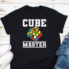 Cube Master Shirt, Rubik's Cube Shirt, Rubik's Solve Lover Shirt, Solve a Rubik's Cube, Rubik Cube Expert, Rubik's Cube Gift, Rubik's Master Ordering Process for our valued customers ~ Please follow all steps to place an order. ~ Please select the hoodie type and size. ~ Please select color of the hoodie from drop down options. ~ If you want to purchase more than 1 , add current item to your cart and then you can click back, add more items for each product. ~ Once all your desired items , you ca Cotton Graphic Design Top As Gift, Cotton Tops With Graphic Design, Multicolor Text Print Tops As Gift, Multicolor Text Print Top As Gift, Multicolor Text Print Top As A Gift, Multicolor Graphic Print Tops As Gift, Transformer Costume, Rubik's Cube, Funny Dad Shirts