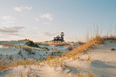 a house on top of a sand dune