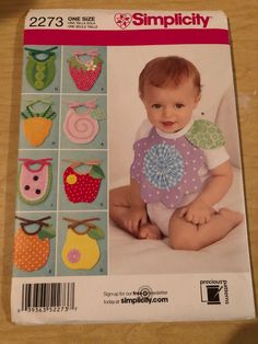 a baby's bib and diaper set in the shape of an apple