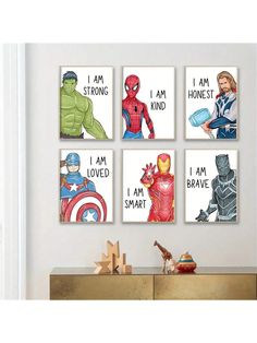 four avengers posters hanging on the wall in a child's room, one has an iron