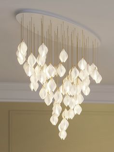 a chandelier hanging from the ceiling in a room