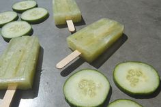 cucumbers and popsicles are arranged on a table