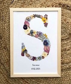 the letter s is made up of flowers