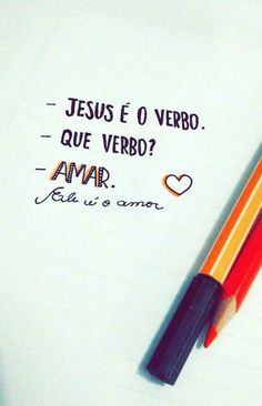 two pencils sitting next to each other on top of a piece of paper that says, jesus e o verbro que verbo? amar