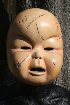 I've always loved Brazil, and found the baby mask from the film delightfully disturbing.  Last year, I finally sat down to begin sculpting my own. The mask itself is made of durable casting latex painted with a latex/acrylic mixture, and has soft, wide, adjustable elastic straps that go around the back of the head to ensure a secure fit.  There is padding inside the mask for comfort and to preserve shape; the mask is very comfortable to wear. If you desire a version in a different color, please Baby Mask, Chicken Toys, Registry Items, Back Of The Head, Latex Paint, Go Around, Cat Friendly, Bobble Head, Collectable Items