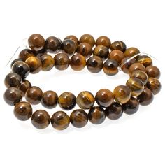 tiger's eye beads on a white background