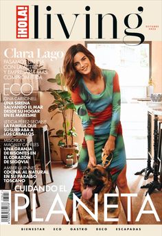 a woman is holding a dog on the cover of living magazine, with an image of her