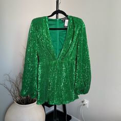 Bright Green Sequins Balloon Sleeve Plunge Playsuit With Built In Shoulder Pads For Definition Size: Us 4 Condition: Brand New Tags Are Still Attached No Returns Xo Green V-neck Jumpsuits For Night Out, Green V-neck Jumpsuit For Date Night, Green Fitted V-neck Jumpsuit, Chic V-neck Jumpsuits And Rompers For Holiday, Green V-neck Jumpsuits And Rompers For Evening, Fitted V-neck Jumpsuits And Rompers For Party, Fitted V-neck Jumpsuits For Party, Summer Party Long Sleeve Jumpsuits And Rompers, Summer Party Jumpsuits And Rompers With Long Sleeves