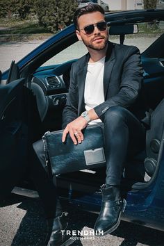 Man sitting in the car showcasing a sunglasses and laptop cover. Free Summer, Men's Sunglasses, Sunglasses For Men, Summer Adventures, Tropical Beach