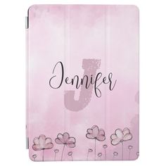 an ipad case with pink flowers and the word'd'on it