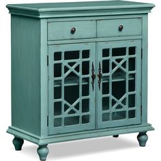 an old blue cabinet with glass doors on the front and bottom, against a white background