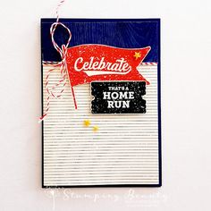 a close up of a greeting card on a white background with red, white and blue ribbon