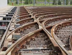 an overhead view of several train tracks