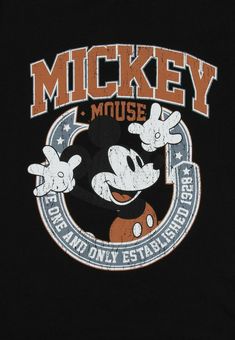 the mickey mouse logo is shown on a black shirt