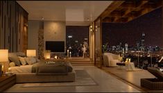 a living room filled with furniture and a large window covered in night time city lights