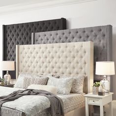 a bedroom with a bed and two nightstands