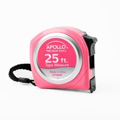 a pink tape measure on a white background