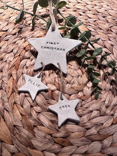 three metal stars on top of a woven basket