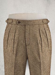 Build the pitch-perfect look with distinctive Irish Brown Herringbone Highland Tweed Trousers that possess a sartorial prowess. Crafted from wool, the trousers with their casual feel and colorful flair are a true sartorial masterpiece that stands out in the best way possible. 
 
 Look Includes  Irish Brown Herringbone Tweed Fabric  Cross Pocket  Forward 2 Pleats  Side Tabs (No Loops)- Arrow Shape  Bottom Cuff (1.5")  Two Welted Back Pockets on Trousers    
 You can change the look by changing th Formal Tweed Pants With Herringbone Pattern, Formal Tweed Bottoms With Herringbone Pattern, Elegant Fitted Tweed Bottoms, Formal Wool Pants With Herringbone Pattern, Formal Tweed Tailored Bottoms, Formal Tailored Tweed Bottoms, Tailored Tweed Pants For Fall, Tailored Tweed Bottoms For Formal Occasions, Formal Tweed Pants For Fall