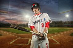 a baseball player is holding a bat on the field at sunset or dawn with dramatic clouds in the background