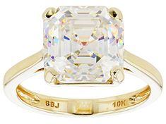 6.25ct square asscher cut Lab Created Strontium Titanate 10k yellow gold solitaire ring. Measures approximately .40"L x .10"W. Gold Gia Certified Asscher Cut Ring, Gia Certified Square Cut Gold Ring, Gold Square Cut Gia Certified Ring, Gold Asscher Cut Gia Certified Rings, Gold Solitaire Asscher-cut Jewelry, Gold Solitaire Asscher Cut Jewelry, Gold Solitaire Ring With Square Cut, Yellow Gold Solitaire Ring, Yellow Gold Solitaire