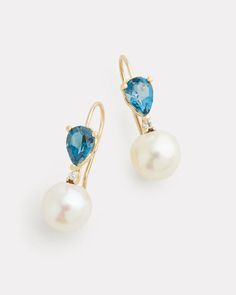 18K Yellow Gold London Blue Topaz Pear Shape, Pearl and Diamond Drop Earring, .05 TCW 7/8 Inch Long x 1/4 Inch Wide Style# YEPSLBTPW Emerald Cut Drop Earrings, Lotus Earrings, Spike Necklace, Sunflower Earrings, Rectangle Earrings, Floral Studs, London Blue Topaz Ring, Book Jewelry, Fan Earrings