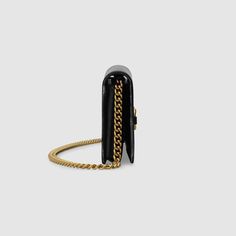 Description The chain wallet in black leather is introduced as part of the Gucci 1955 Horsebit accessories collection, defined by the double ring and bar design also found in Handbags. The folded snap-closure shape features several card slots and pockets, completed with a detachable chain strap. Size: 7.5″W x 3.9″H x 1.6″D / 19 x 9.9 x 4 cm 100% genuine materials, matching the quality of the Gucci product (imported from Europe); Black leather Gold-toned hardware Moiré and suede lining Horsebit detail 6 credit card slots 1 zipper pocket 1 open pocket Detachable chain with 22.8″ drop Snap button closure Open: 7.5″W x 8.3″H x 1″D Comes with dust bag, ation cards, and pamphlets 1:1 mirror image qualityDelivery 5-8 or 10-15 working days Please note that during high season and Sale period, deliv Gucci Chain Wallet, Wallet With Chain, Gucci Horsebit, Chain Wallet, Double Ring, Accessories Collection, Wallet Chain, 6 D, Small Accessories