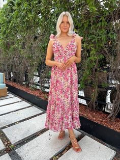 Needing a gorgeous, floral print dress for a summer wedding? Our Capri Maxi Dress is a pink, and yellow floral dress with a v-neckline, ruffle straps, and a self tie, corset back! Wear her for any formal occasion! Style Recommendations: - Pair a heel to dress her up for a wedding! - Add bold jewelry and sleek your hair back for a chic, trendy look! Product Description and Materials: - Pink floral dress - V- neckline -Ruffle straps - Lace up corset back - Bodycon silhouette - Machine wash cold / Floral Maxi Dress Outfit, Maxi Dress Outfit Summer, Tie Corset, Wedding Guest Accessories, Pink Floral Maxi Dress, Maxi Dress Outfit, Yellow Floral Dress, Corset Back, Bold Jewelry