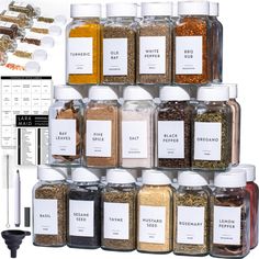 an assortment of spices and seasonings displayed in glass jars with labels on each side