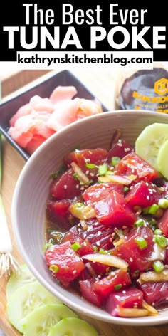 the best ever tuna poke is served in a bowl with cucumbers and pickles