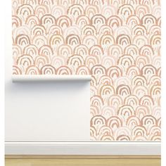 a wallpaper with an abstract design in pink and gold