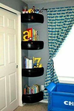 a book shelf in the corner of a child's room