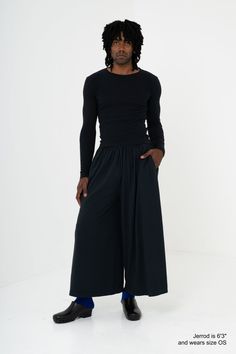 Each leg is made from the same side-seam-free tube as our Trash Tee. Fit is drapey and voluminous, with an ultra wide leg, elastic waistband, extra long drawcord, and side pockets. Details - 100% North American Reclaimed Waste Cotton- 6.5 oz jersey- Midweight cotton- Unisex- One size fits many- Biodegradable, except for the elastic- Preshrunk and ready to wear- Knit, sewn and finished in Los Angeles, California with a fair-wage workforce Size Chart Measurements are approximate and may deviate 1' Pockets Details, Super Dark, Ultra Wide, Dark Grey Color, Los Angeles California, Extra Long, North American, Color Variations, Gray Color